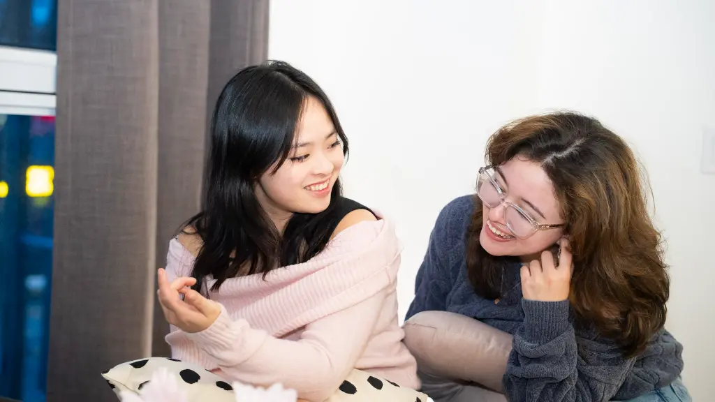 Student reading in a bright bedroom suite
