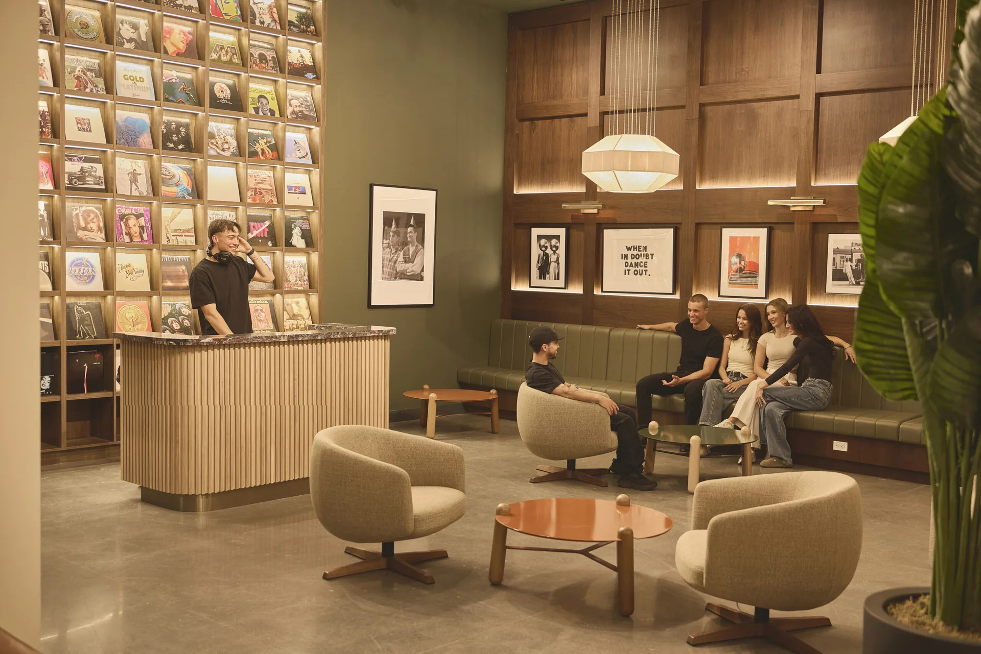 Residents in The Collective bar and lounge at ALMA @ ByWard Market, housing for students and young professionals in downtown Ottawa