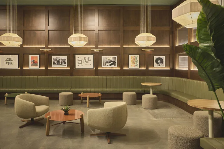 Social lounge with banquette seating and armchairs