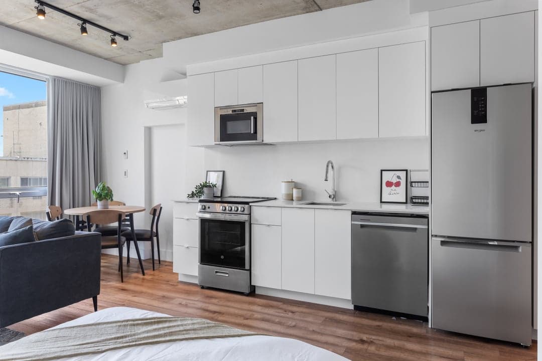 Suite living area with downtown Montreal city views