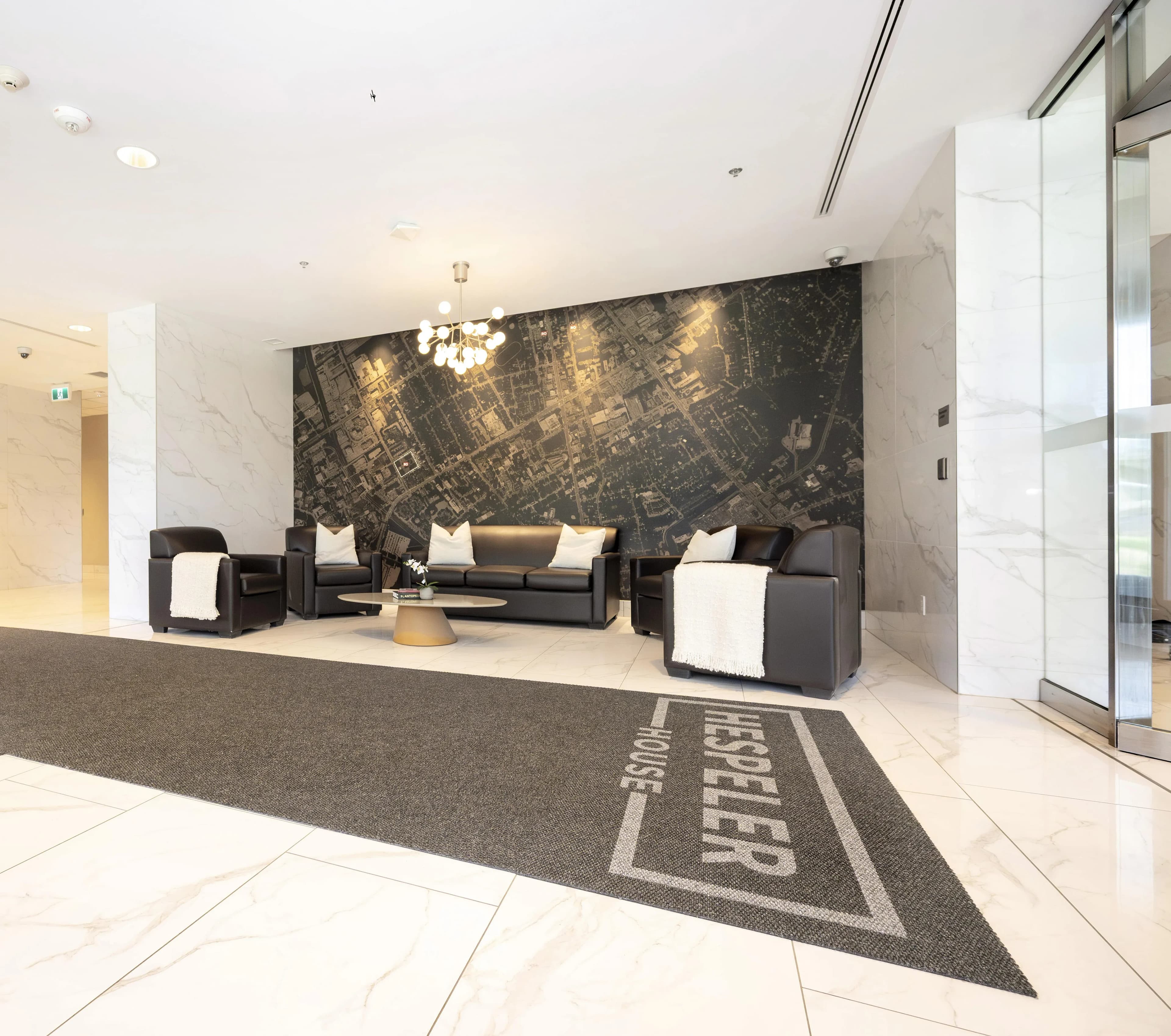 Elegant apartment lobby with contemporary leather seating