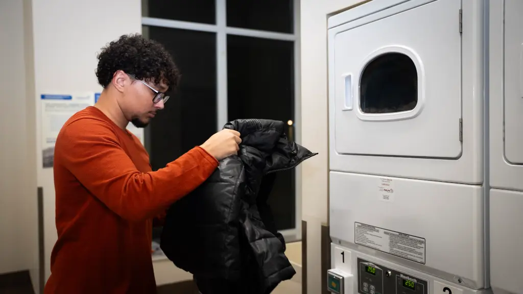 Resident doing laundry on site
